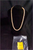 Knotted Pearl Necklaces
