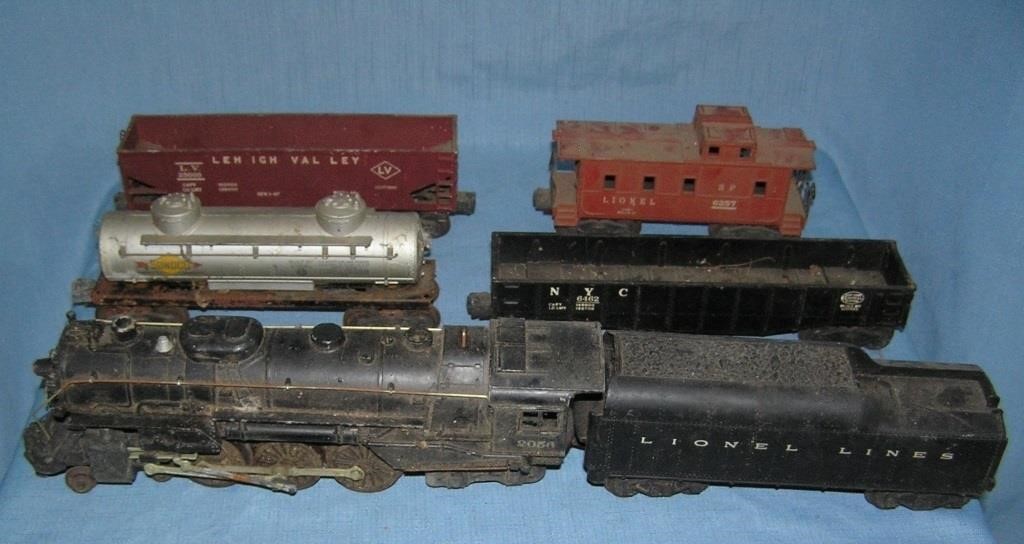 Box full of old Lionel trains
