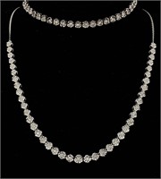 A White Gold Diamond Necklace and Tennis Bracelet.