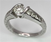 An 18K White Gold Diamond Crossover Ring. 0.50ct t