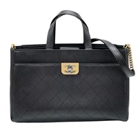 A Chanel black quilted caviar leather straight lin
