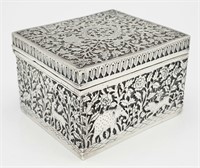 A SOLID SILVER HINGED TRINKET BOX HAND ENGRAVED WI