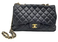 A Chanel Black Caviar Classic Single Flap Bag. Qui