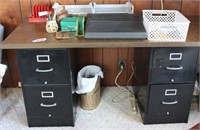 filing cabinets (2); counter; typewriter