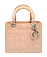 A pink Christian Dior Cannage quilted patent leath