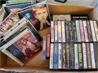 assorted CDs and cassette tapes