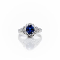 Antique Platinum Ceylon Sapphire Diamond Halo Ring