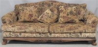 Ashley upholstered sofa, carved base