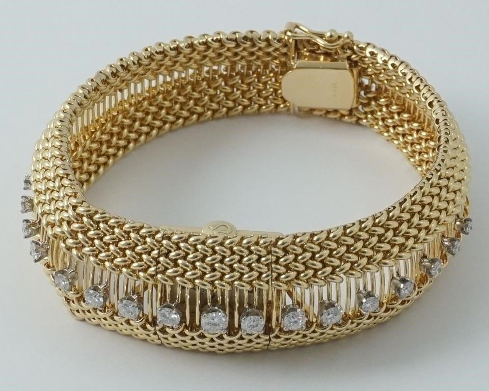 Lady's Omega bracelet watch in 14K & diamonds