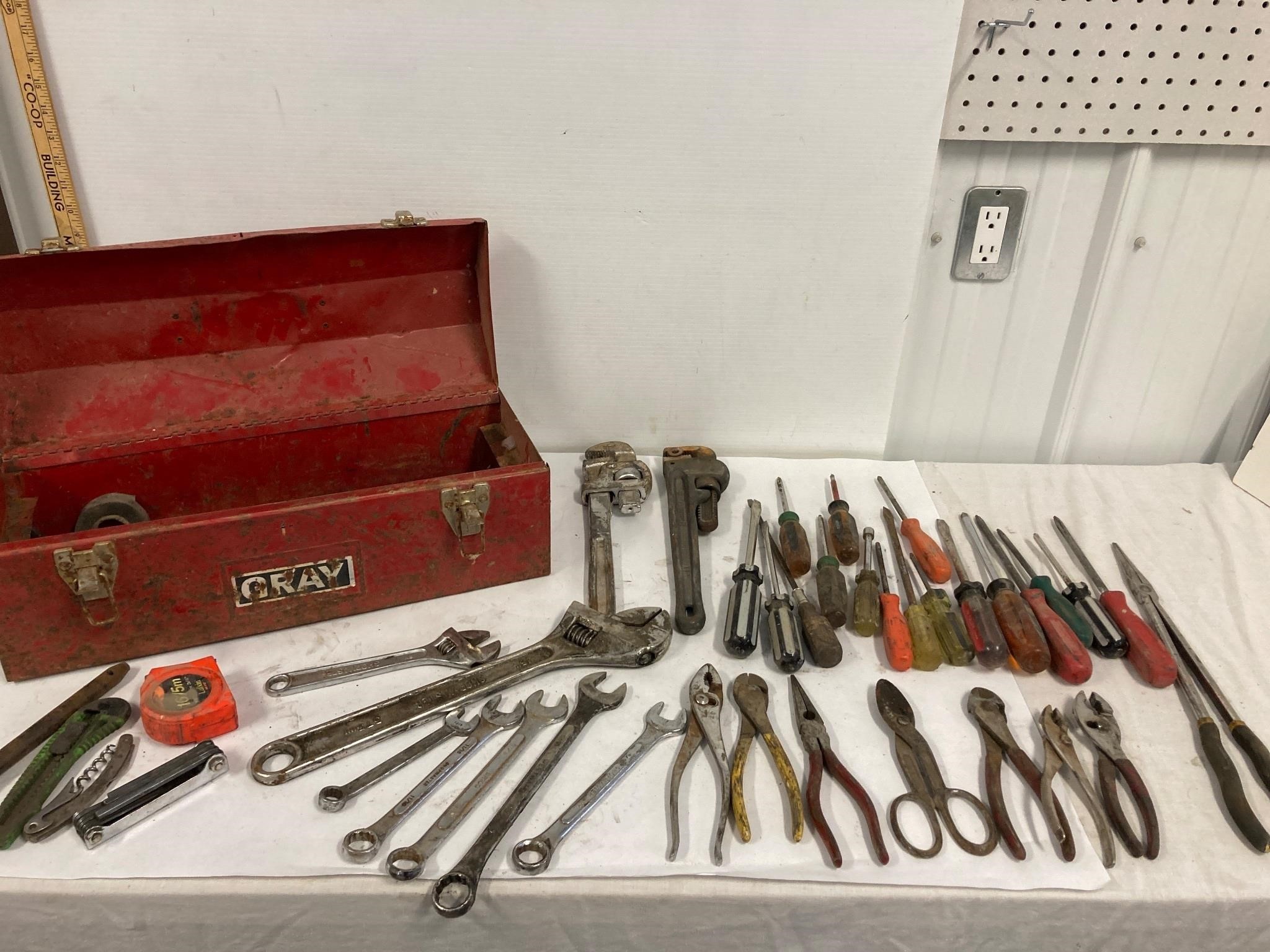 Tool box full of tools.