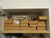 17 boxes of stainless handles