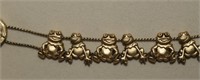 Gold Tone Bracelet With Many Frogs