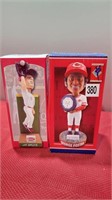 2 nib reds bobble heads