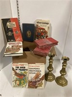 Lot of books and candle sticks