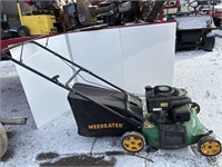 Weedeater push lawnmower with bagger