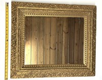 Miroir-cadre antique en bois et plâtre