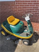 Yard Man Riding Lawnmower