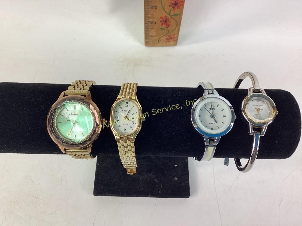 Women’s wristwatches gold and silver tone link