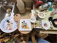LOT OF DISNEY CUTTING BOARDS AND TRIVETS