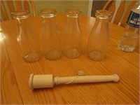 4 milk bottles & toy