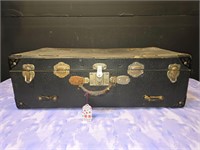 Vintage hard side suitcase w/ table clothes & felt