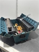 Green toolbox with contents