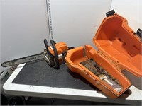 Stihl chainsaw in orange case