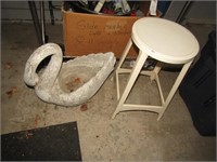 metal stool & damaged concrete swan