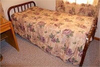 Twin sized vintage Jenny Lind-style bed; shows