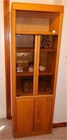 Wooden display cabinet w/ storage; measures