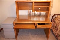 Wooden computer desk; has glass protective
