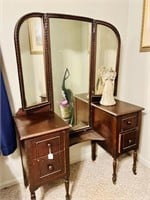 Vintage vanity on casters; side mirrors are