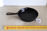6 1/2-inch cast iron skillet; marked 3  Located