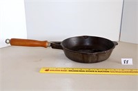 8-inch cast iron skillet w/ wooden handle; made