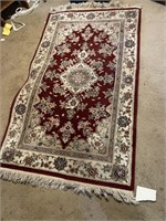 "oriental rug  62"long x 35.5" wide with padding