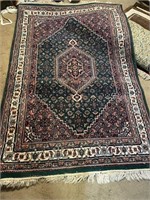 oriental rug 48.5"w x 73" long with padding