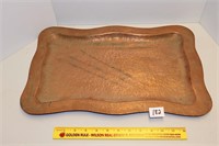 Serving tray, appears to be copper  Located in