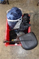 Tote of motorcycle related items including a