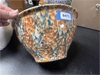 large pottery bowl, small hairline cracks, spackle