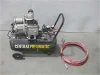 Central Pneumatic Air Compressor Powered On