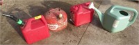 3 gas cans and a sprinkling can
