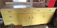Yellow garage cabinet approx. 6' wide