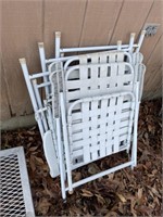 5 white patio chairs