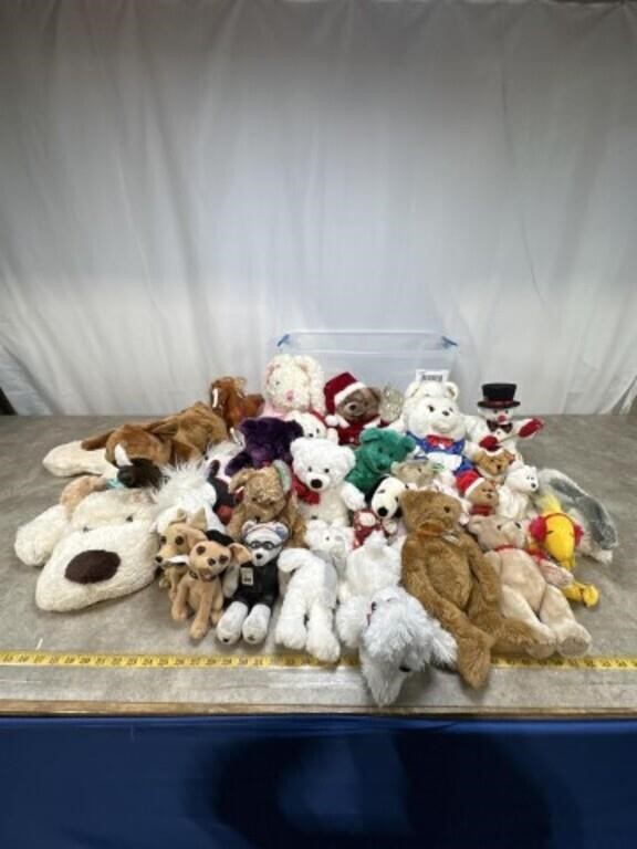 Assortment of stuffed animals with tote