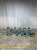 Vintage bottles and Ball blue quart jars, some