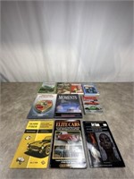 Assortment of car books and picture taking books