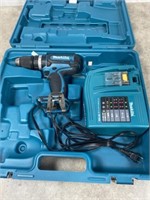 Makita driver drill with charger and hard case,