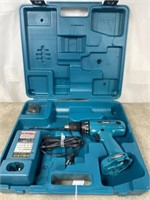 Makita driver drill with charger, no battery.