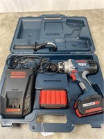 Bosch driver drill with batteries and charger.