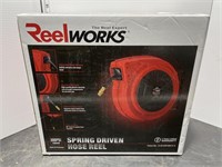 Spring driven hose reel